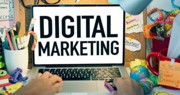 a person using a laptop with the words digital marketing on it